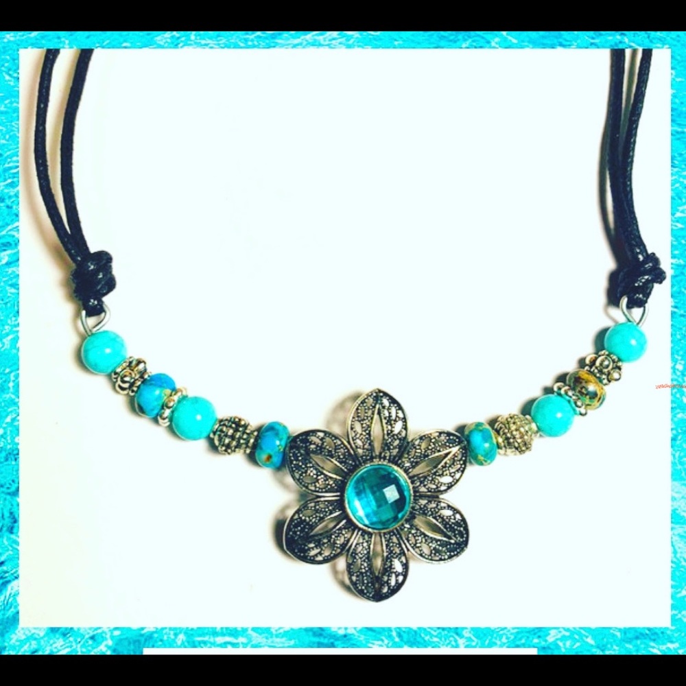 Turquoise daisy necklace.